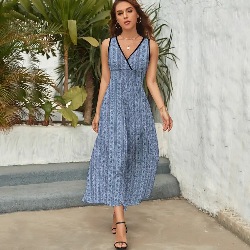 Blue stripe sleeveless maxi dress featuring a stylish V-neckline and playful pattern