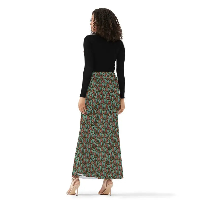 Woman in black top and floral skirt showcasing Womens Peacock Feather Fishtail Maxi Skirt
