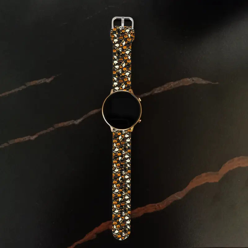 Stylish Smartwatch with glittery gold and silver wristband, perfect for Halloween vibes