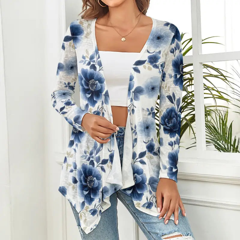 Floral women’s knitted cardigan in blue and white, featuring a unique design and long sleeves