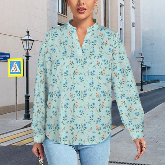 Floral print blouse with a light blue-green background, perfect for your Blooming Gorgeousness Tunic.