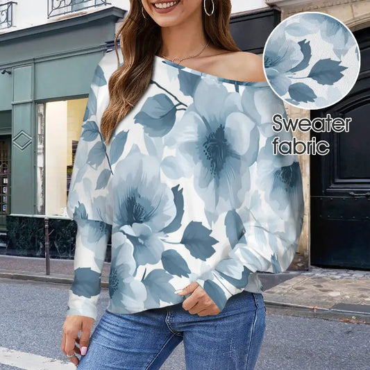 Off-shoulder sweater featuring a dusty blue floral pattern for spring style.