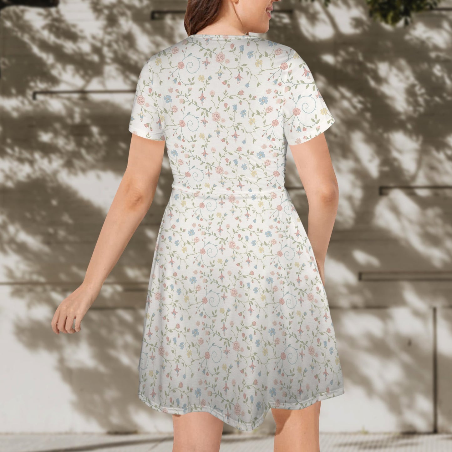 Back view floral fit and flare dress with structured waist