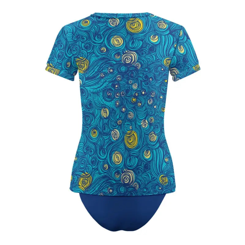 Back view of blue art print swim top and bikini bottoms