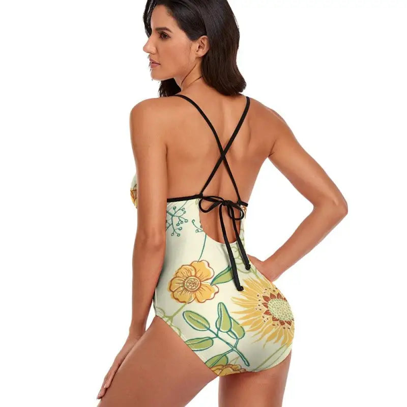 Back view of one-piece swimsuit with adjustable cross-back straps