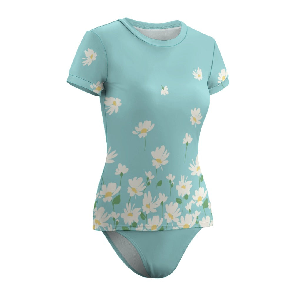 Blue daisy swimsuit product flat lay
Floral short sleeve swim set front product image