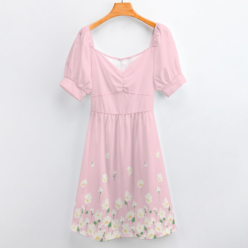 Blush floral puff sleeve dress hanging display