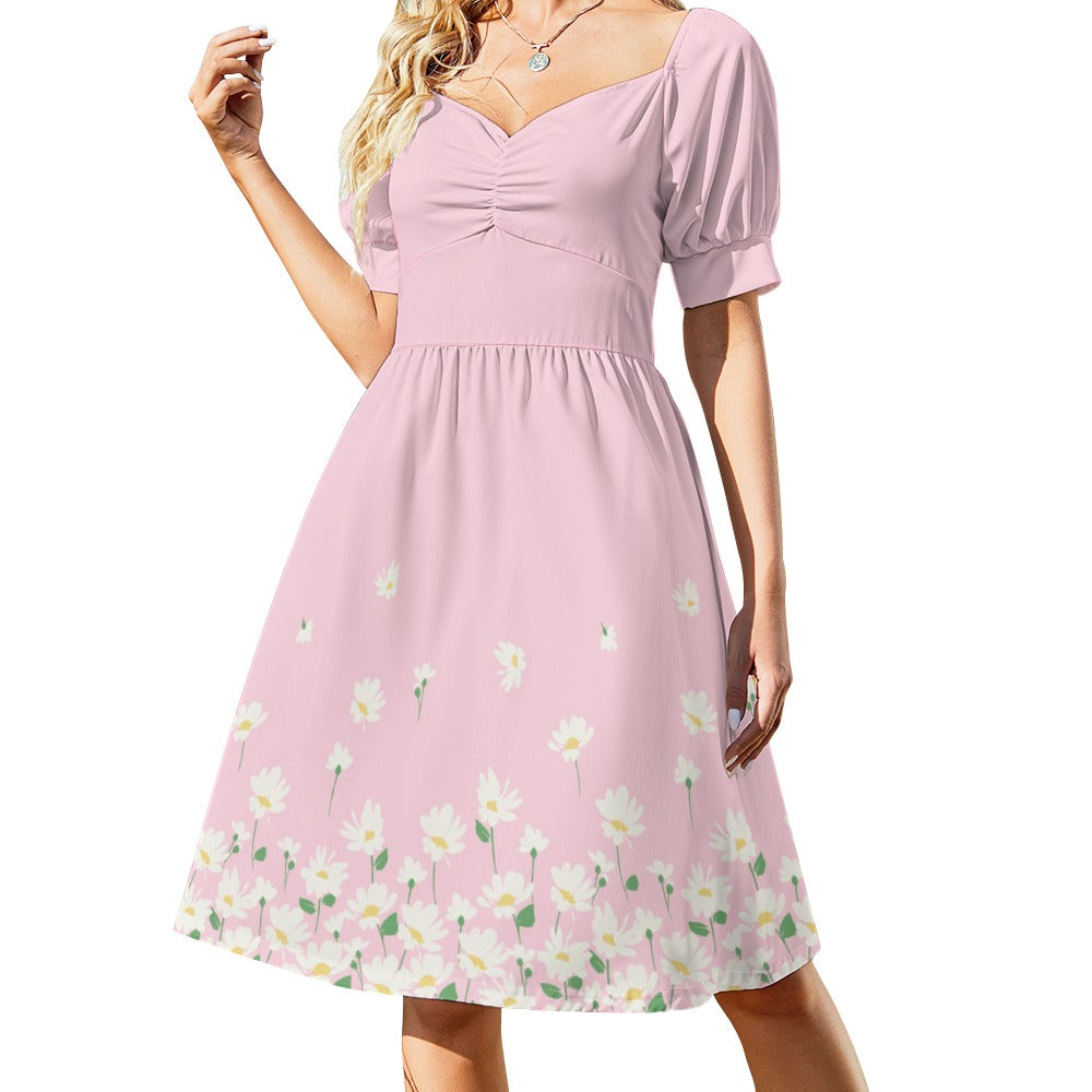 Blush floral puff sleeve midi dress front view on model