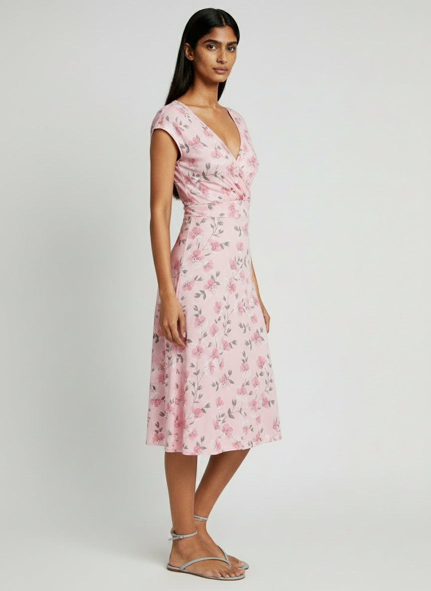 Blush pink floral V-neck midi dress side angle