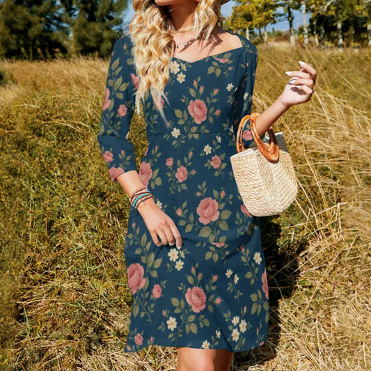 Dark floral cottagecore midi dress with square neckline and 3/4 sleeves worn outdoors