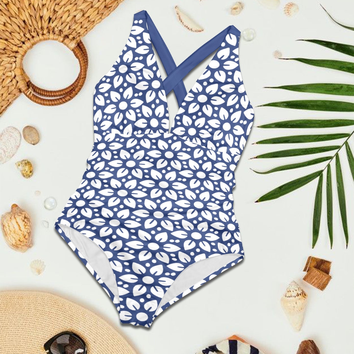 Flat lay of blue floral V-neck one-piece swimsuit