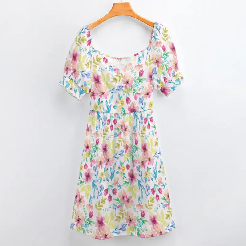 Floral puff sleeve midi dress hanging on hanger front view