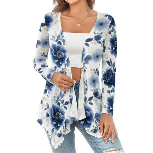 Front view of blue floral open front drape cardigan layered over white tank with jeans.