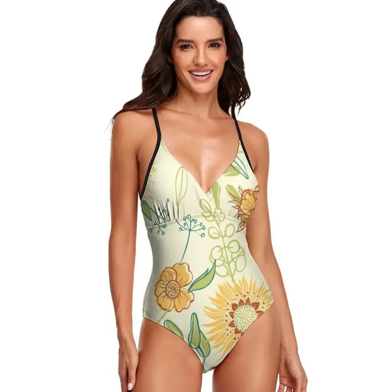 Front view of meadow print one-piece with black trim detailing