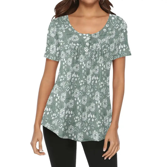 Front view of sage floral scoop neck tunic top paired with black pants