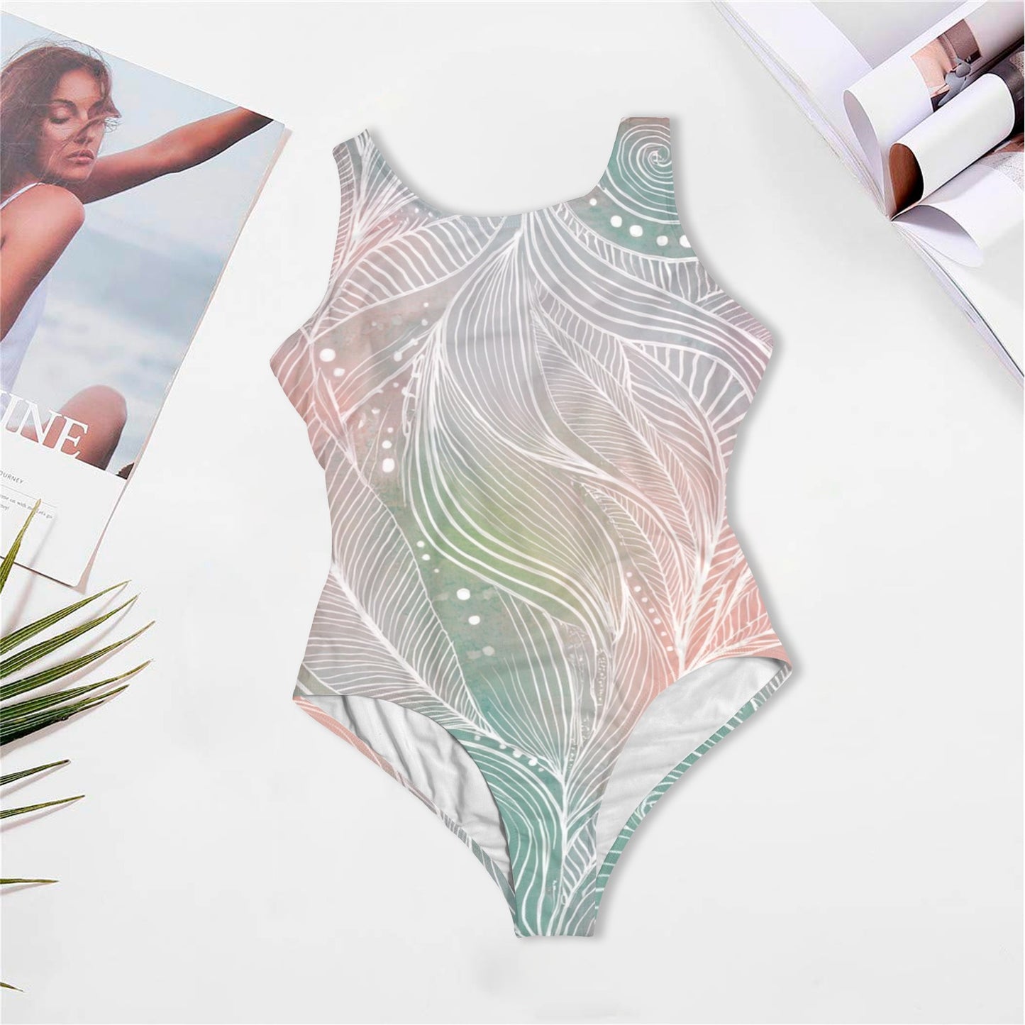 Pastel abstract one piece swimsuit flat lay product image