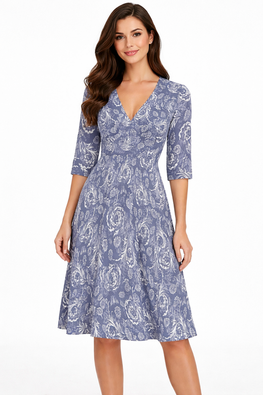 Slate blue floral fit and flare midi dress front view on brunette model
