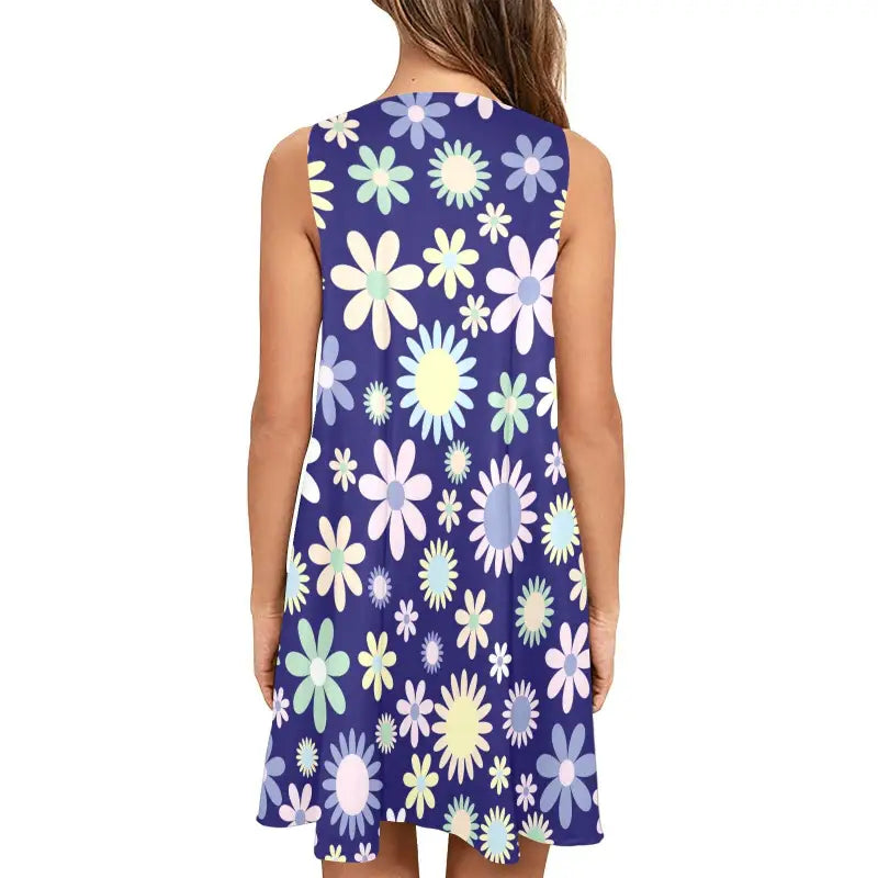 Sleeveless A-Line pocket dress with fun blue floral pattern on a purple background
