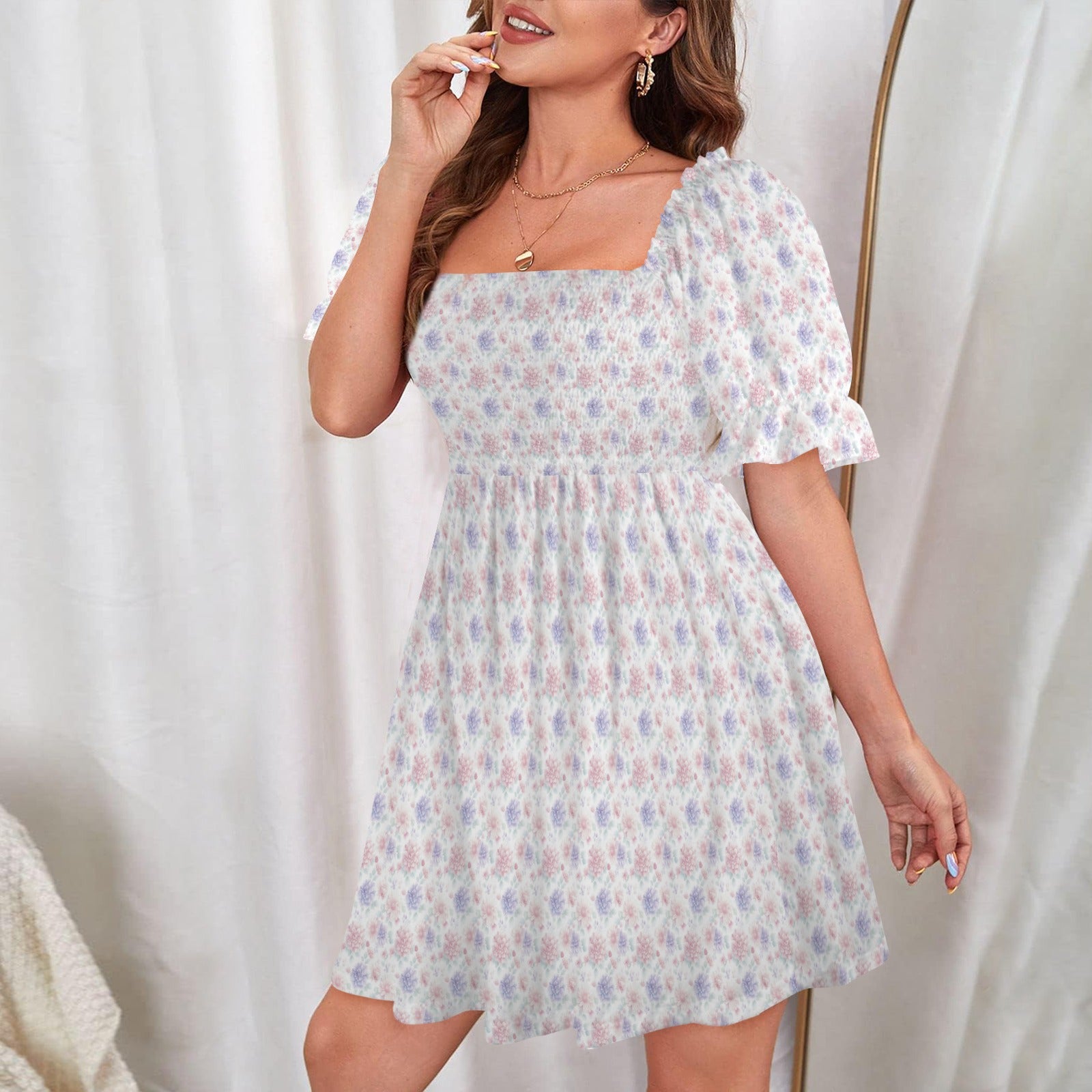 Soft floral mini dress with puff sleeves and gathered bodice