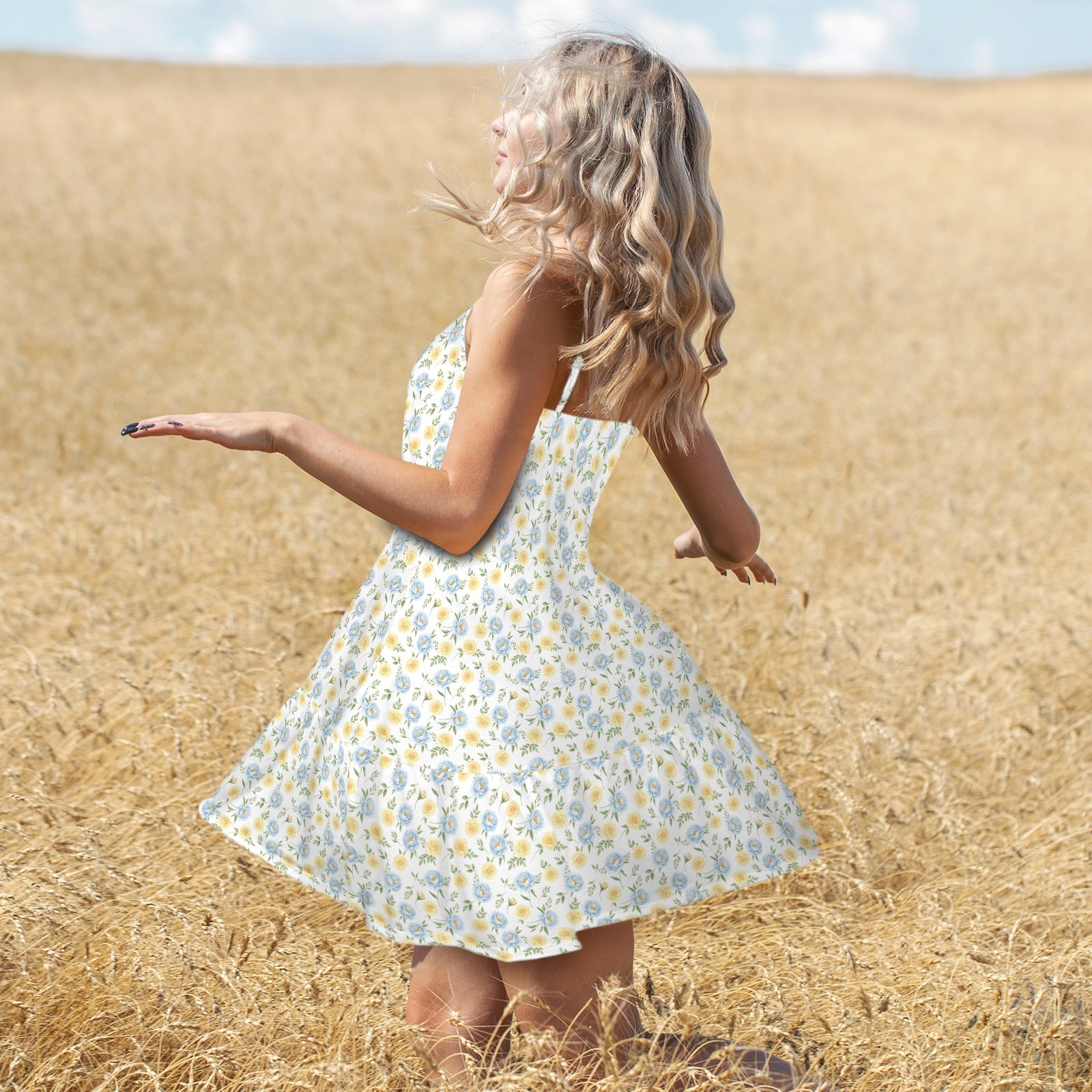 back view tiered floral mini dress flowy silhouette movement