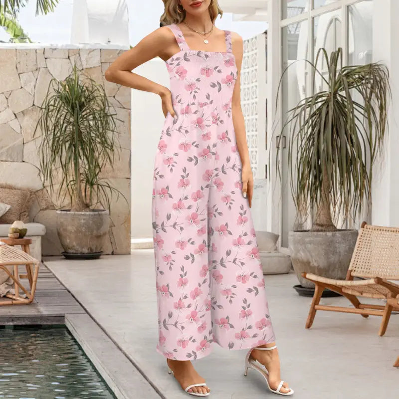 Stylish pink floral jumper with wide-leg pants, perfect for a fresh summer look