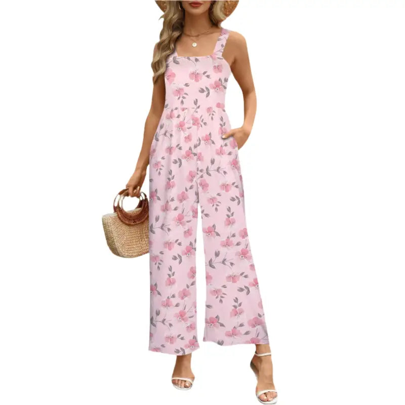 Stylish pink floral jumper with wide legs and pockets for a fresh, fun look