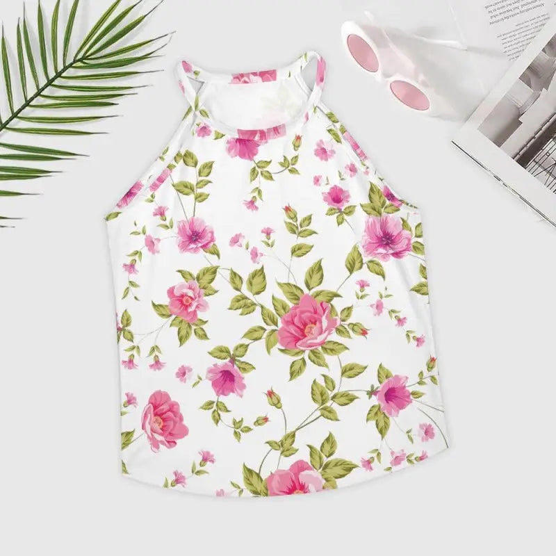Floral print tank top featuring pink roses and green leaves on a white background