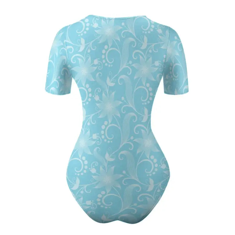 Light blue floral bodysuit with white swirl patterns perfect for brunch styling