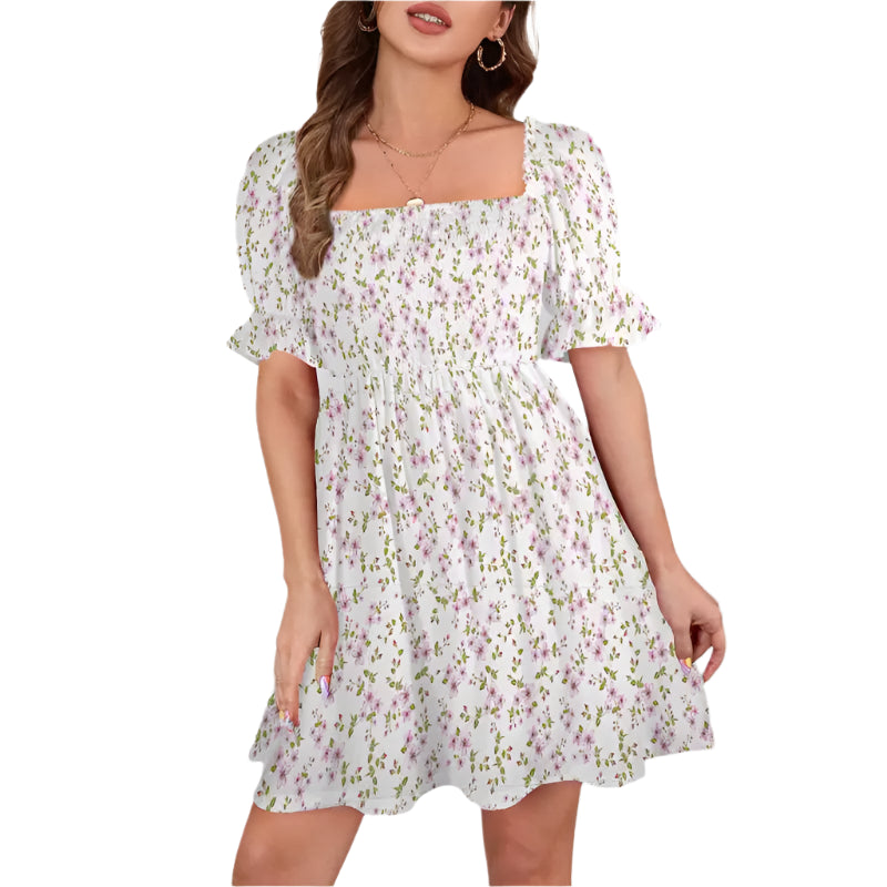 White floral print dress with puff sleeves and ruffle hem for boho fun and style