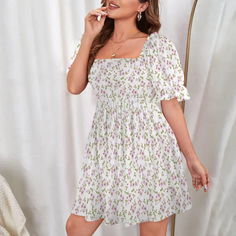 Floral print mini dress with puff sleeves and ruffle hem for boho fun and style