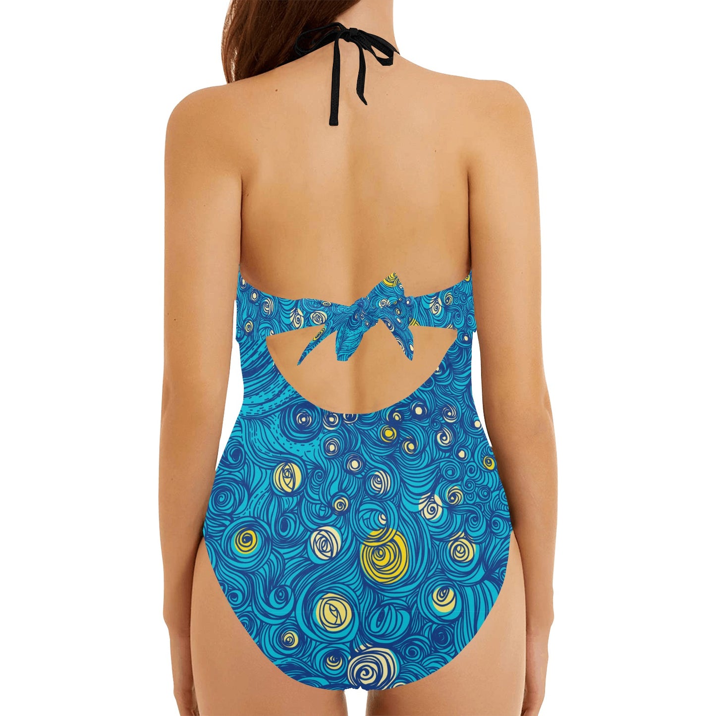 Back view of abstract swirl one-piece swimsuit with halter tie and open back