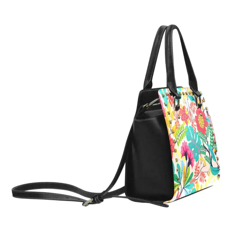 Colorful floral rivet shoulder handbag with black trim and straps for stylish practicality