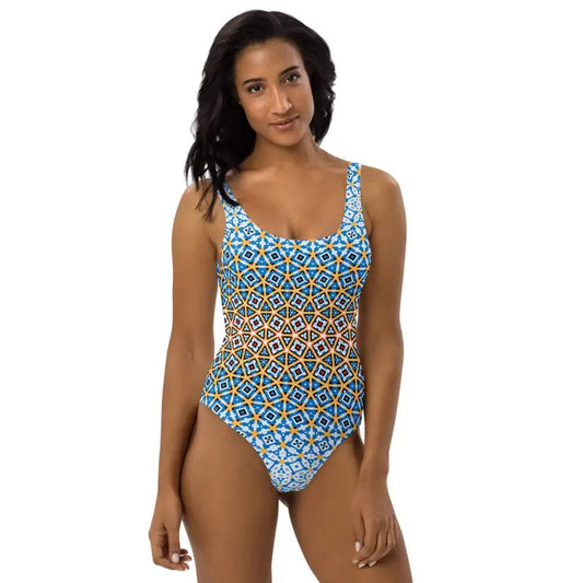 Colorful blue geometric tank style one-piece swimsuit with a fun pattern ideal for summer