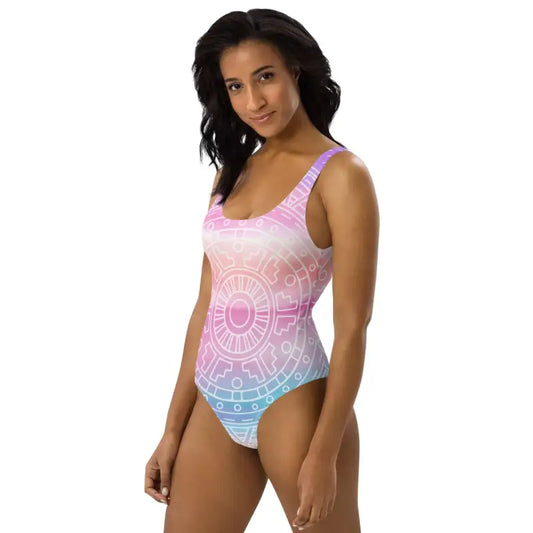 Colorful pastel mandala one-piece swimsuit with a vibrant pink to blue design