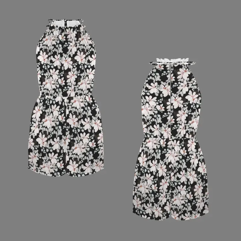 Sleeveless floral romper with black and white pattern adds spring vibes to any wardrobe