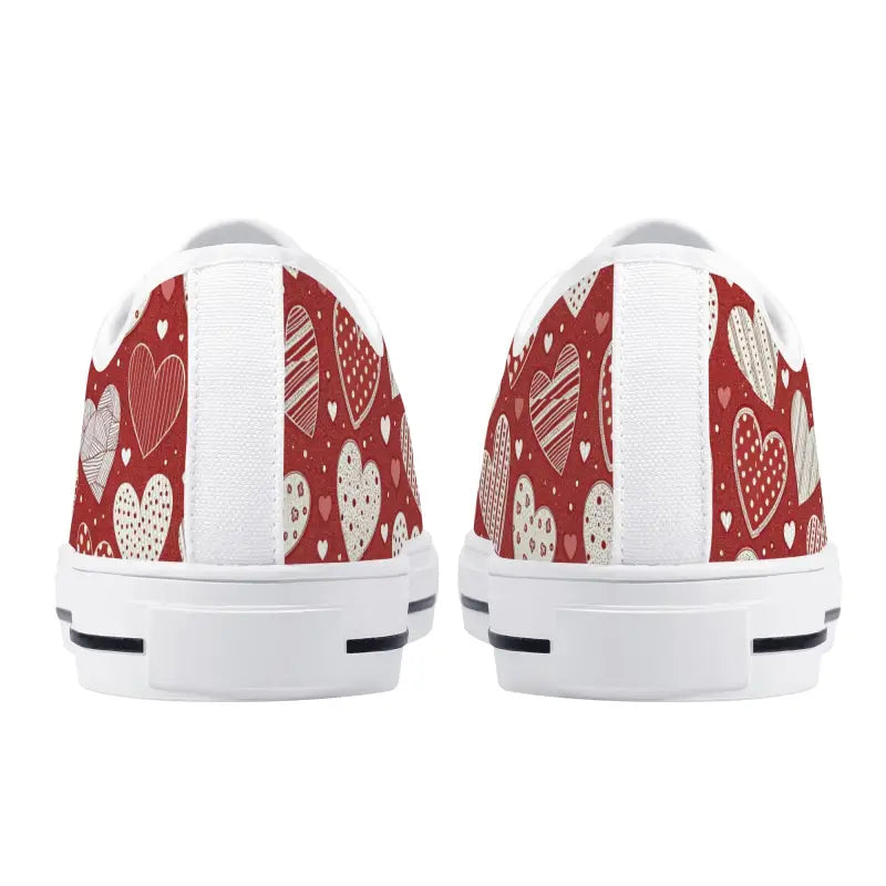 Red and white heart-patterned Womens Low Valentine Sneakers perfect for Valentine’s Day