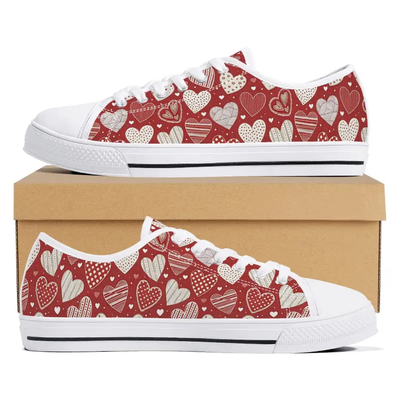 Red and white women’s low Valentine sneakers with cute heart patterns for Valentine’s Day