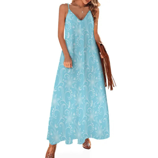 Light blue sleeveless maxi dress with white floral pattern, perfect for spring vibes