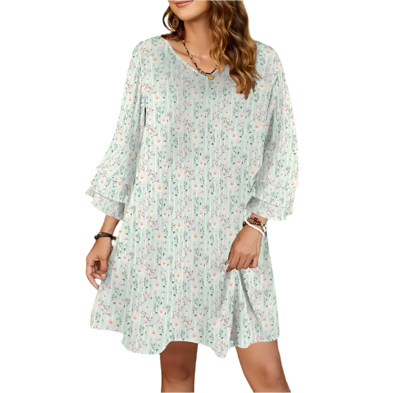 Flowy white boho dress with flared sleeves and mint green pink floral print