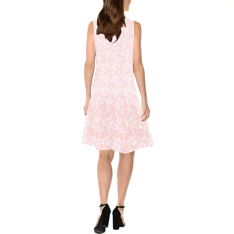 Sleeveless pale pink lace dress with flared skirt perfect for any fun occasion