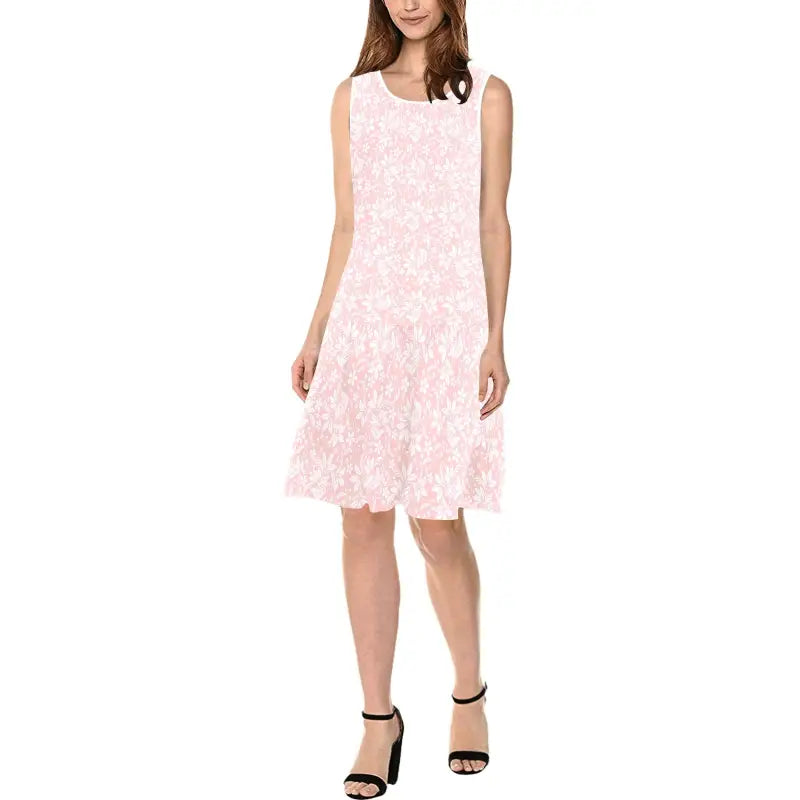 Sleeveless pale pink lace dress with flared skirt, perfect floral sleeveless shift style