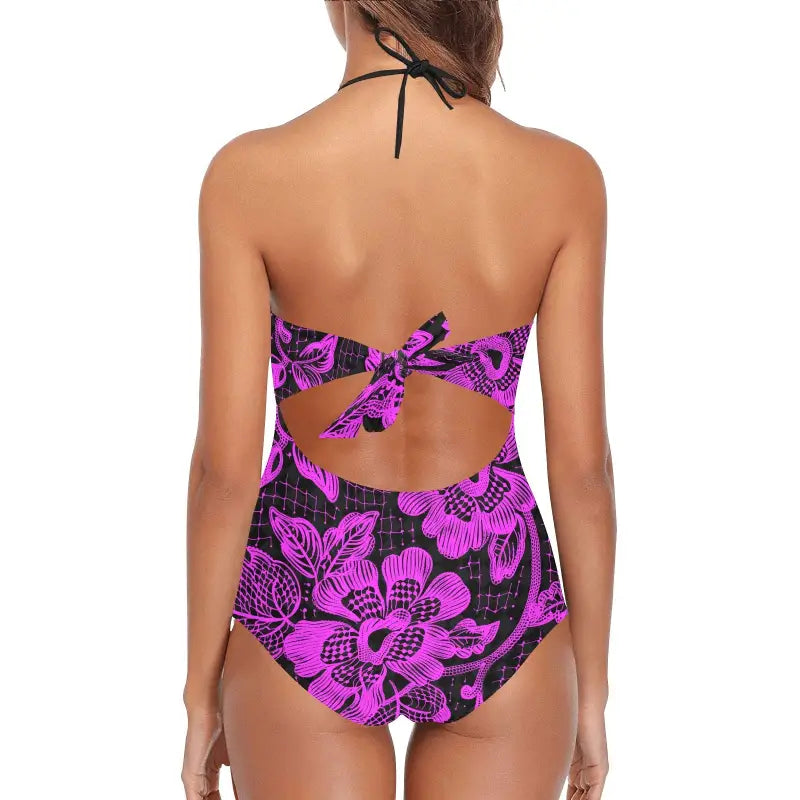 Purple and black floral print lace band swimsuit with a trendy back cutout and tie detail