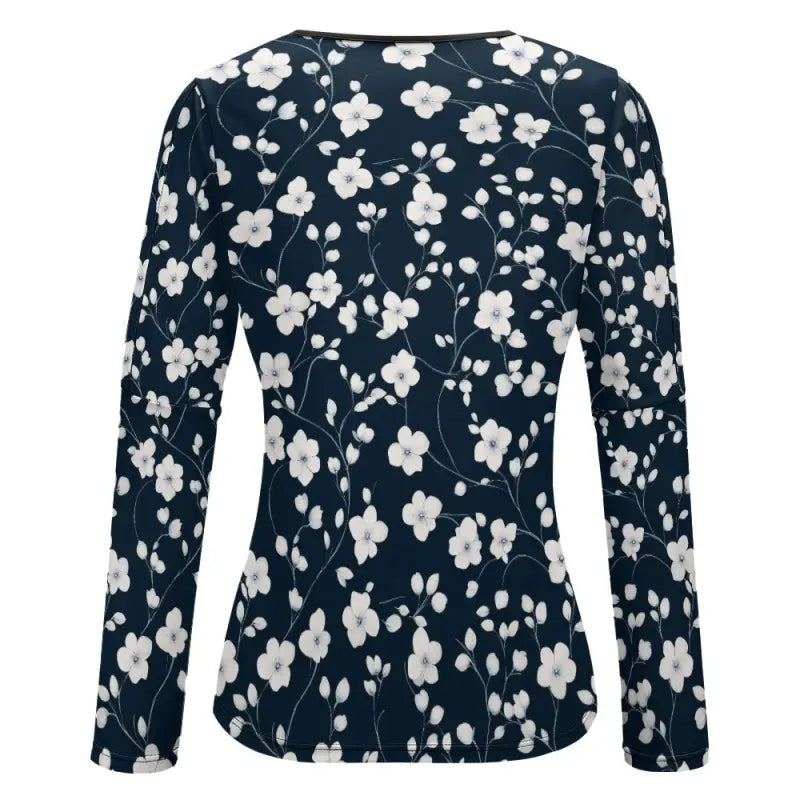 Navy blue long-sleeved floral cold shoulder top with white print for a stylish look