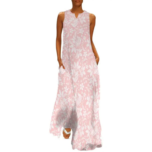 Sleeveless pink floral maxi dress with pockets and V-neckline, perfect for summer fun