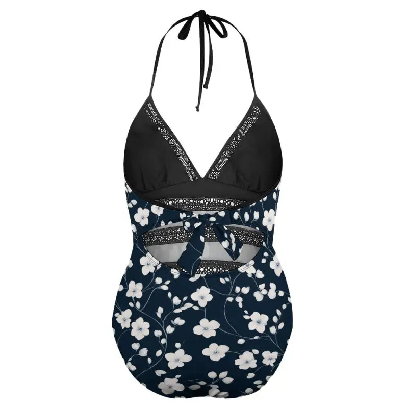 Halter neck floral one-piece swimsuit in navy blue and black with white floral print