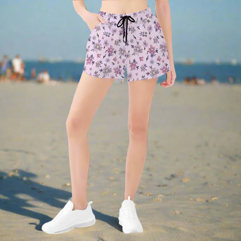 Womens purple floral shorts with drawstring waist, perfect for casual beach vibes