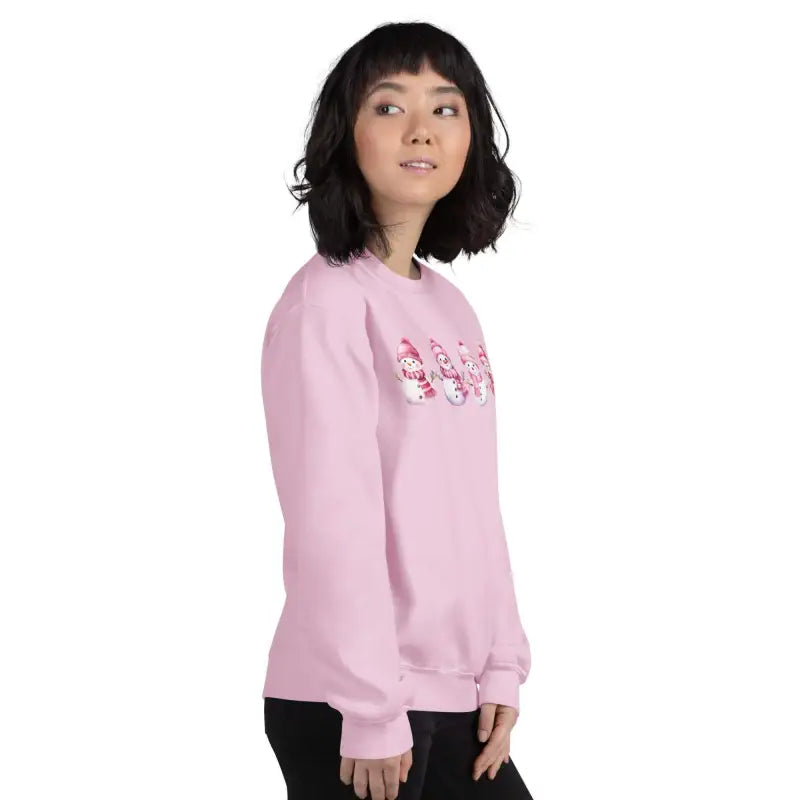 Pink sweatshirt with floral text, perfect for cute Snowman Christmas vibes