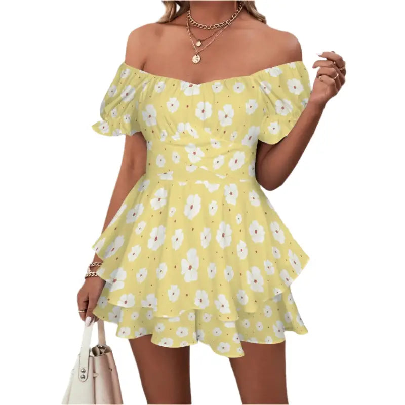 Cute yellow floral off-shoulder romper with ruffled tiers and puff sleeves