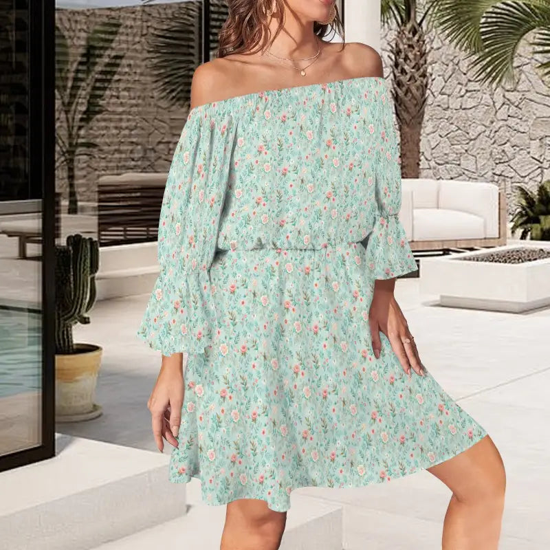 Mint green off-shoulder floral dress with ruffle sleeves and gathered waist, backless style