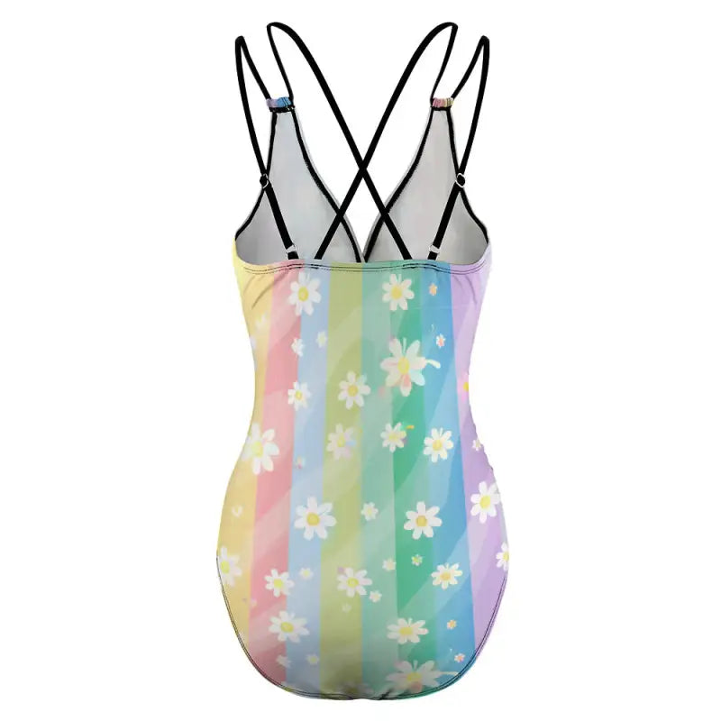 Pastel rainbow one-piece with daisy patterns and criss-cross straps for ultimate style